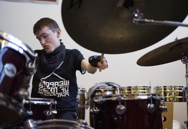 Owen playing drums